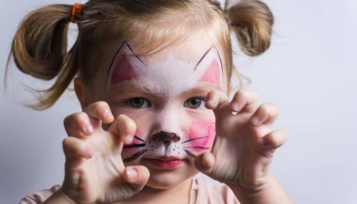 Toddler-with-Face-Painted-Like-Cat